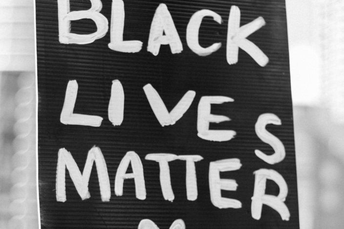 Handmade sign reading "Black Lives Matter" 